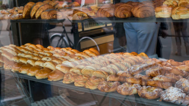 Artisan breakfast pastries on bakery shelf